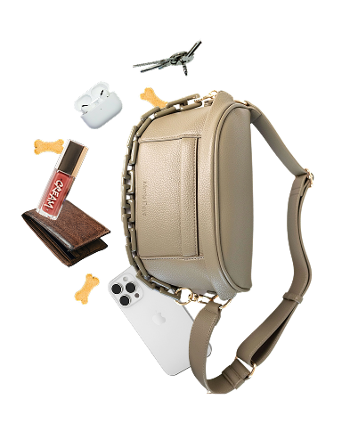 A Mazie Days bag with a phone, keys, wallet, AirPods, lip gloss and dog treats